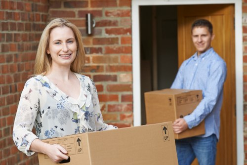 Flat removals in Cranford with moving boxes in a hallway